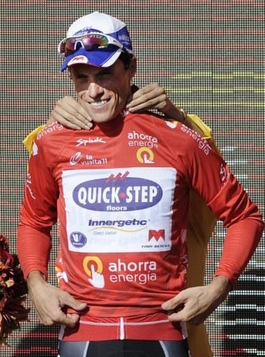Sylvain Chavanel (Quick Step) pulls on the leader's red jersey