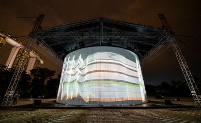 Ron Arad’s 720°. A large light show on a stage.
