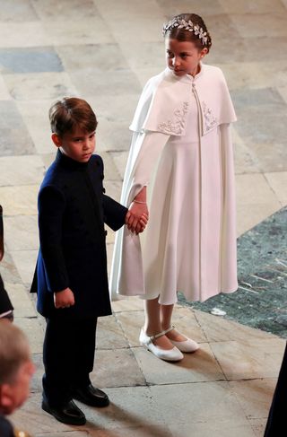 Britain's Princess Charlotte of Wales and Britain's Prince Louis of Wales arrive at Westminster Abbey in central London on May 6, 2023, ahead of the coronations of Britain's King Charles III and Britain's Camilla, Queen Consort. - The set-piece coronation is the first in Britain in 70 years, and only the second in history to be televised. Charles will be the 40th reigning monarch to be crowned at the central London church since King William I in 1066. Outside the UK, he is also king of 14 other Commonwealth countries, including Australia, Canada and New Zealand. Camilla, his second wife, will be crowned queen alongside him, and be known as Queen Camilla after the ceremony.