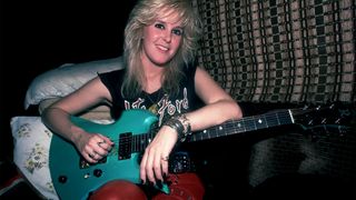 Portrait of American Rock musician Lita Ford as she poses in her tour bus, Chicago, Illinois, September 30, 1984. 