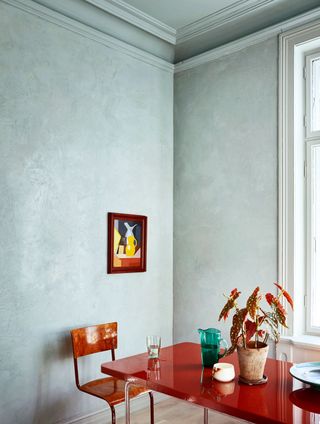 a dining room with a limewash paint effect