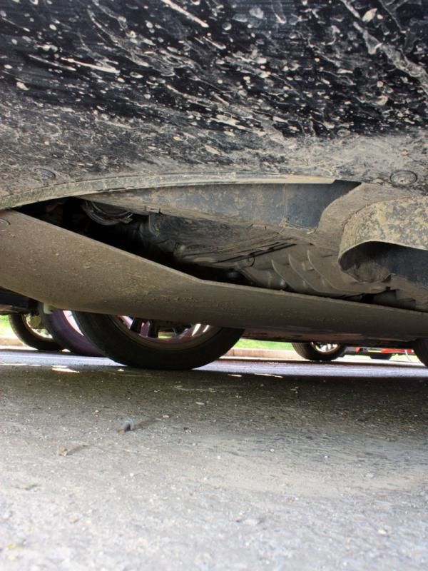 Even the cars take a beating on Paris-Roubaix's infamous cobbles. The bottom of this BMC vehicle is armored with a steel plate to shield the oil pan.
