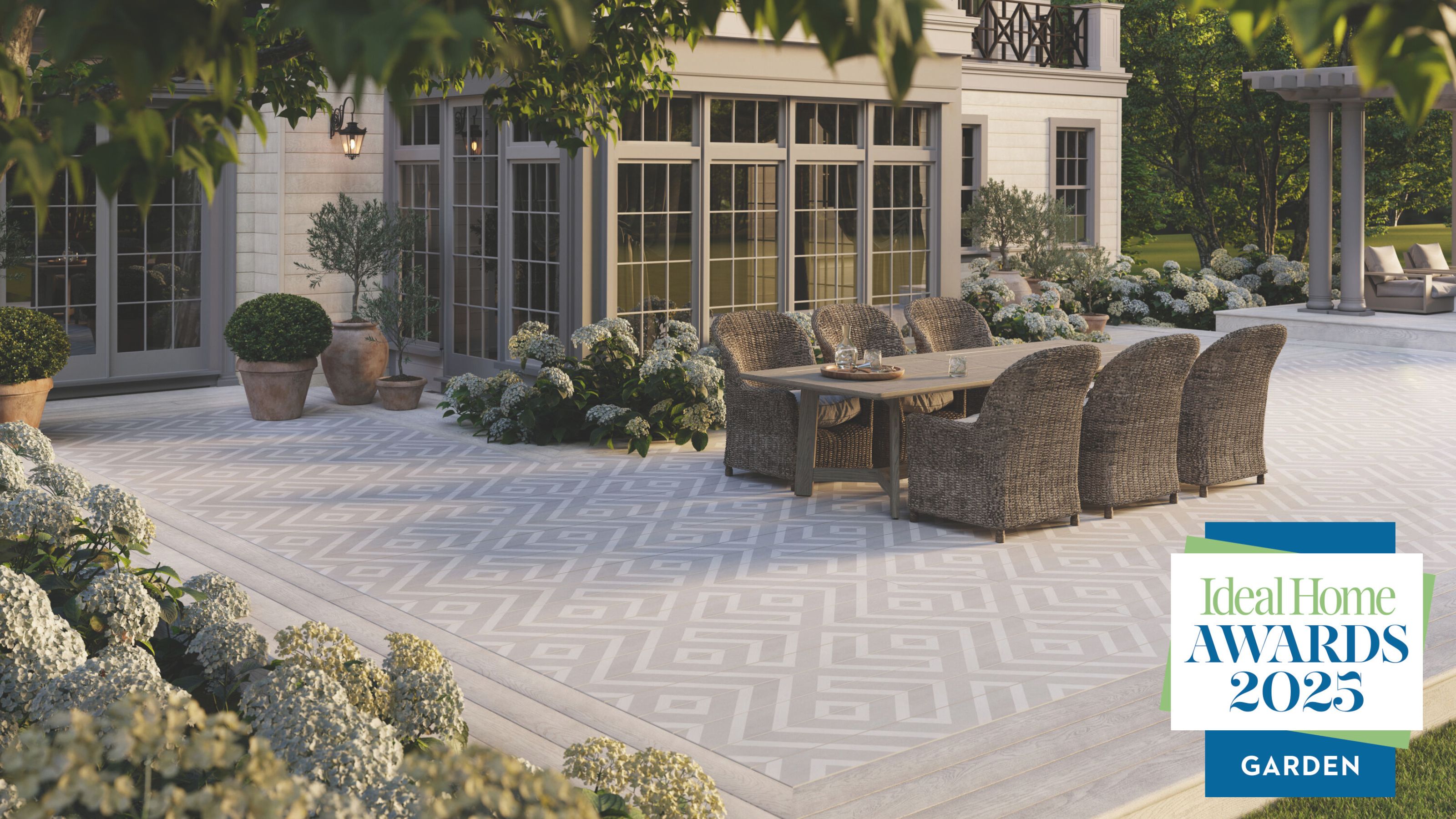 Ideal Home Awards 2025 garden logo in front of Millboard Modello
