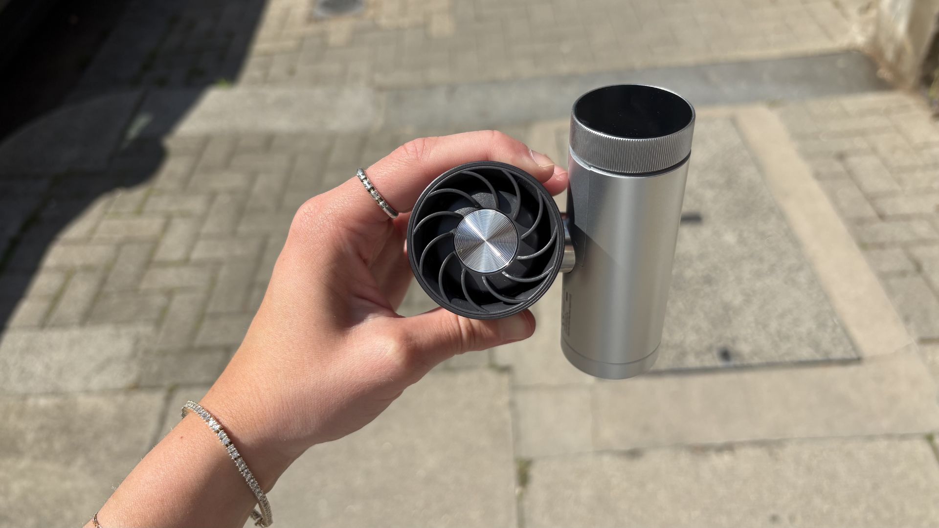 Shark ChillPill 3-in-1 Fan, Mist &amp;amp; InstaChill System being tested outside with the fan