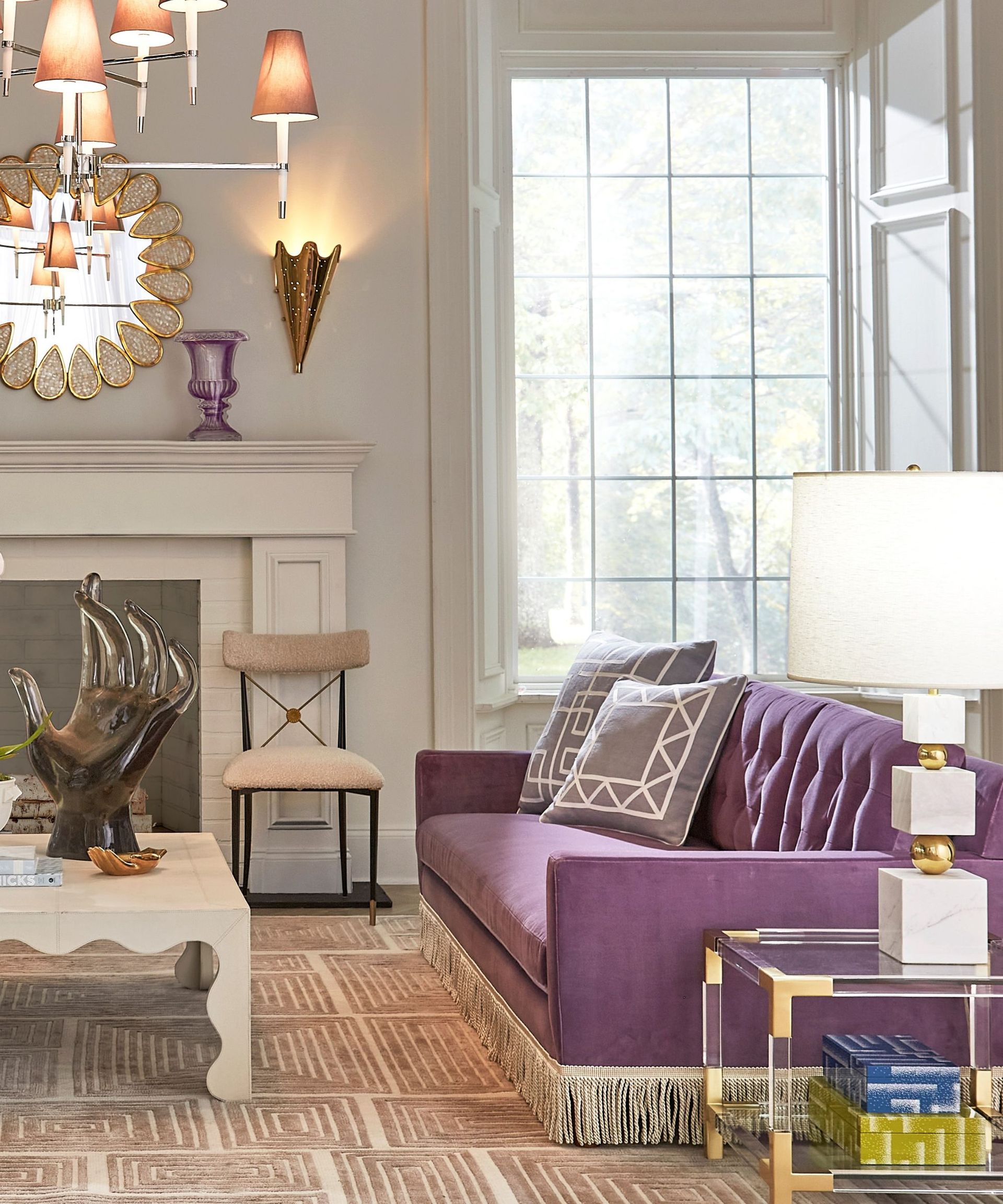 maximalist living room with purple sofa and quirky accessories