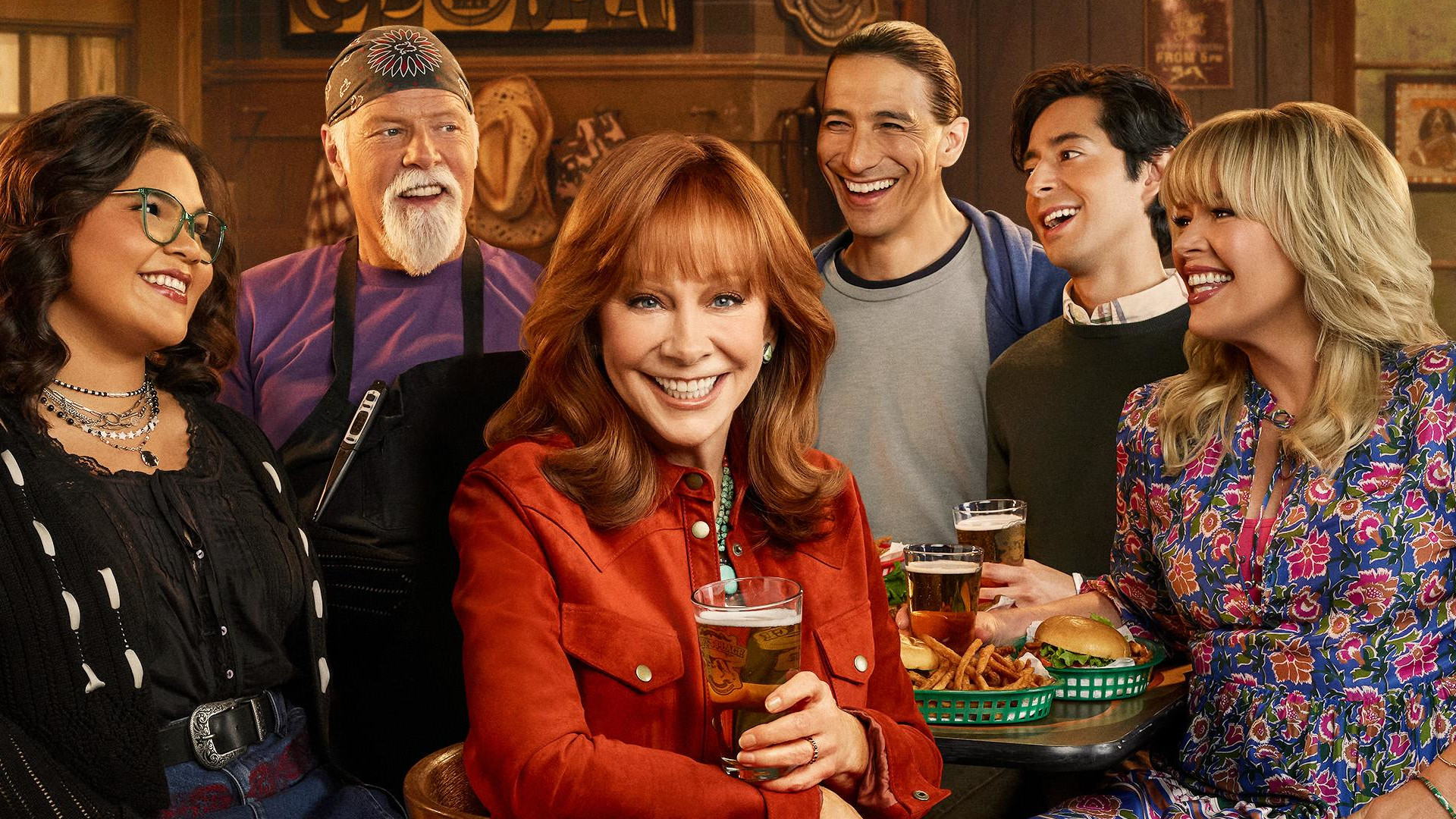 The cast of Happy's Place in promotional image for the show