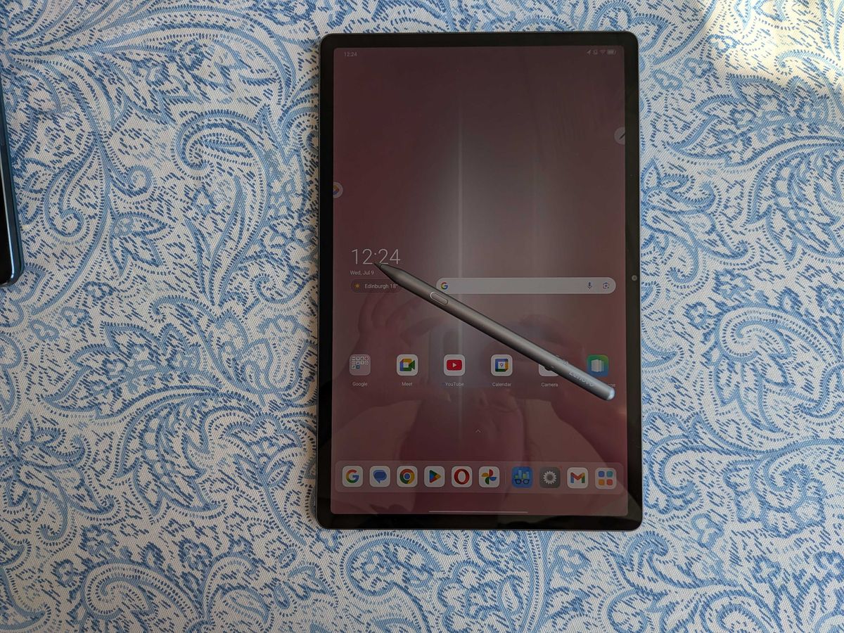A Lenovo Idea Tab Pro tablet on a blue and white table