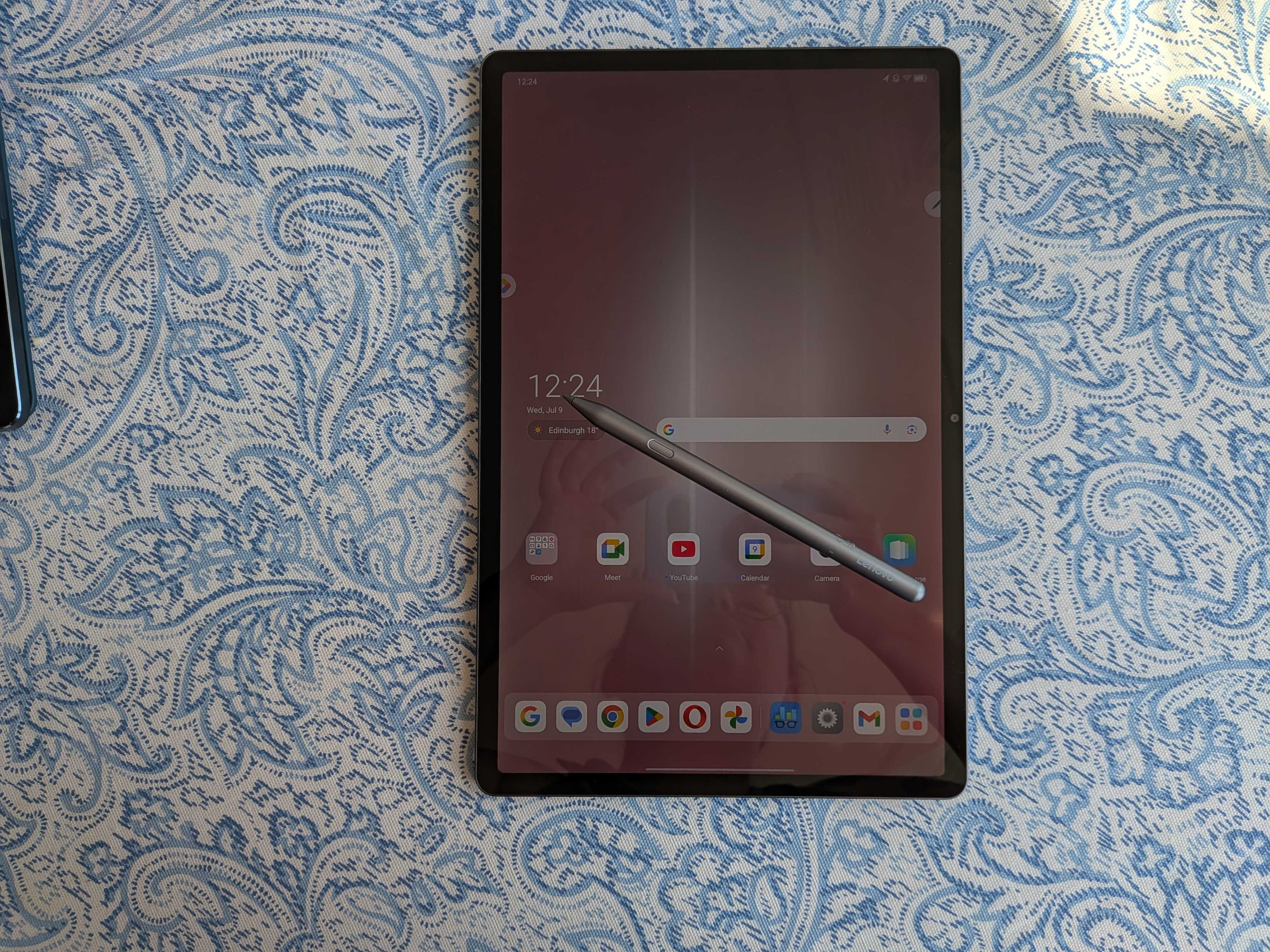 A Lenovo Idea Tab Pro tablet on a blue and white table