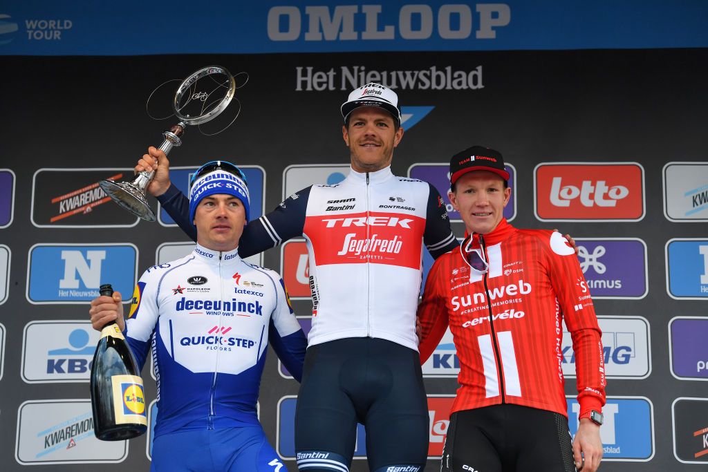NINOVE BELGIUM FEBRUARY 29 Podium Yves Lampaert of Belgium and Team Deceuninck QuickStep Jasper Stuyven of Belgium and Team Trek Segafredo Soren Kragh Andersen of Denmark and Team Sunweb Celebration Trophy during the 75th Omloop Het Nieuwsblad 2020 Men Race a 200km race from Ghent to Ninove OmloopHNB OHN20 on February 29 2020 in Ninove Belgium Photo by Tim de WaeleGetty Images