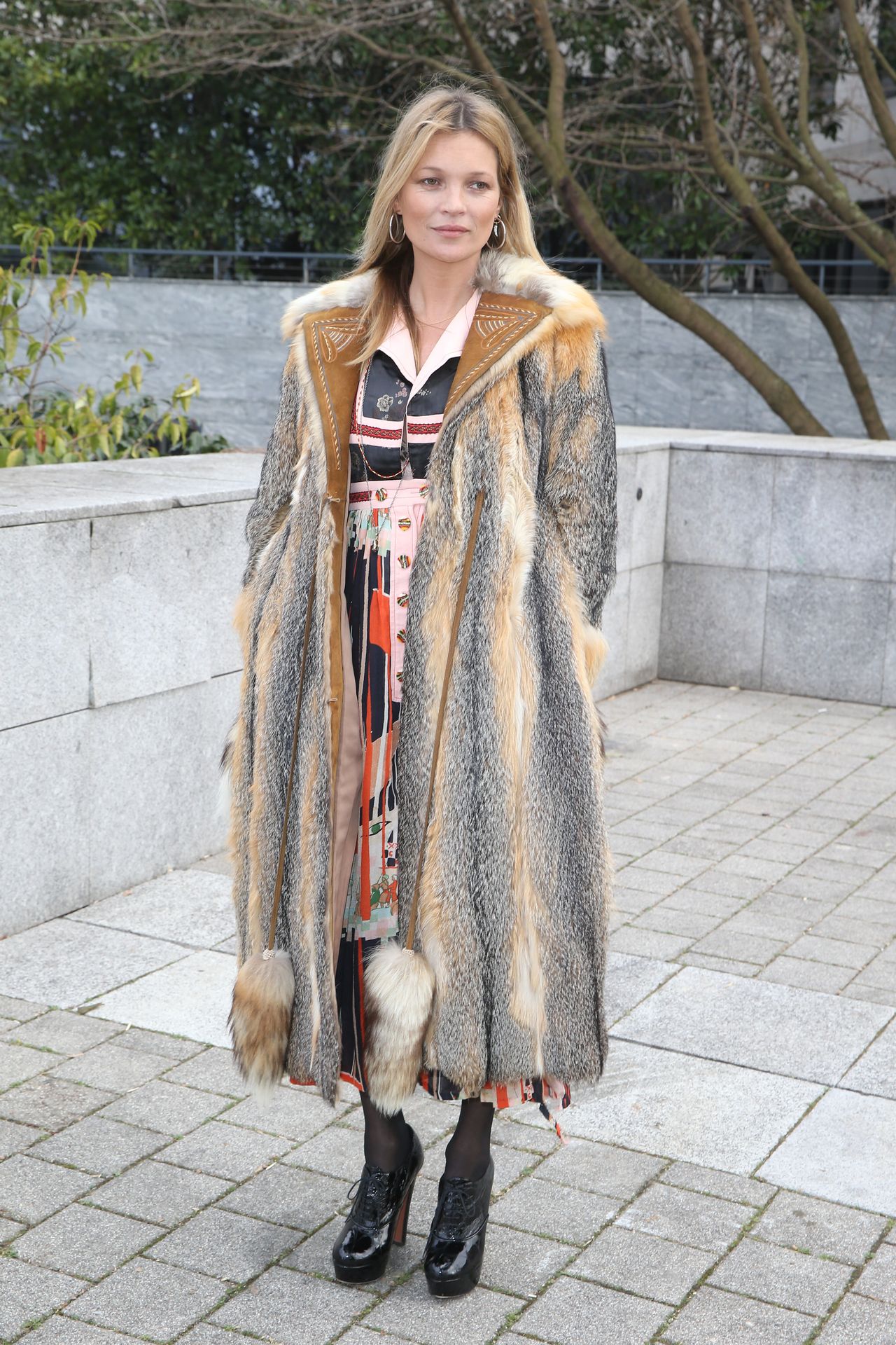 Kate Moss in 2015 at the Louis Vuitton Menswear Fall/Winter 2015-2016 Show as part of Paris Fashion Week.