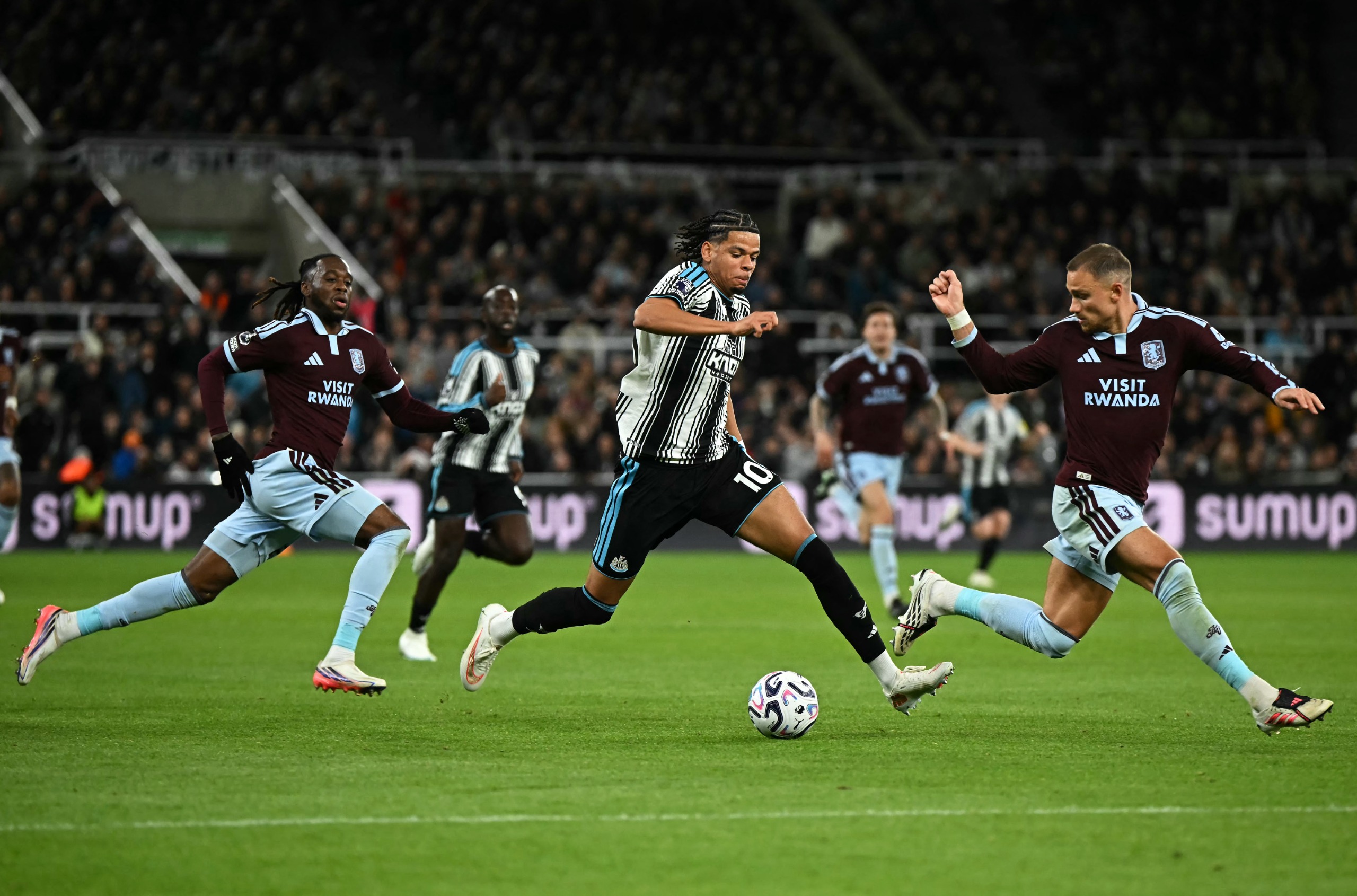 Newcastle United's Danish striker William Osula runs with the ball against Aston Villa