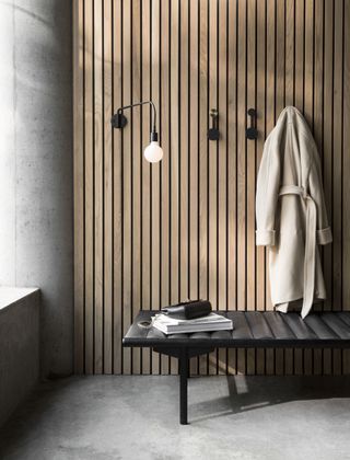 hallway with concrete floor and wood by nest