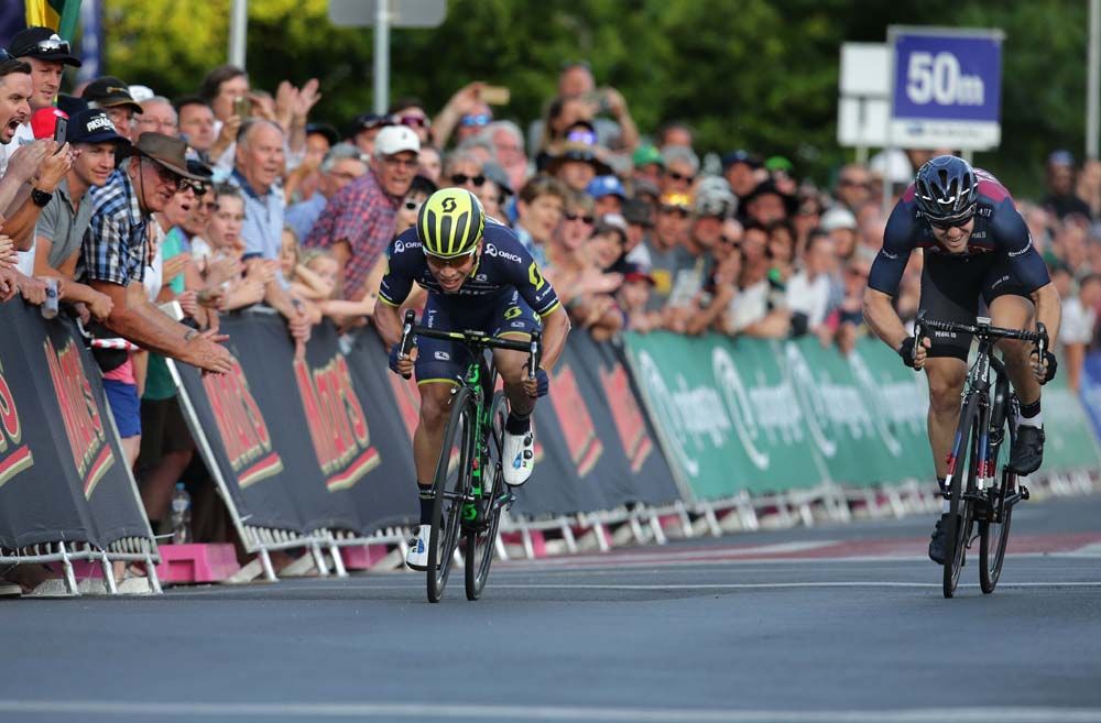 Caleb Ewan (Orica-Scott) sprints up the barriers