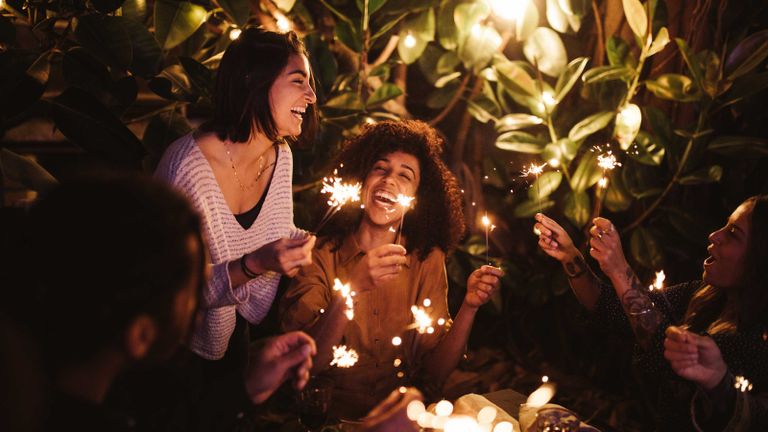bonfire night ideas: sparklers at garden party