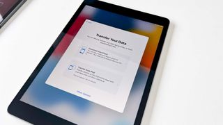 An iPad asking whether to transfer data from another nearby iPad or from iCloud