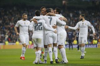 Real Madrid players celebrate a goal in their 8-0 win over Malmo in the Champions League in December 2015.