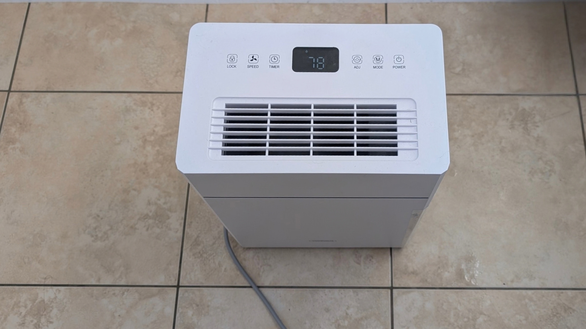 The Vonhaus 10L Slimline Dehumidifier in Liz's home being tested