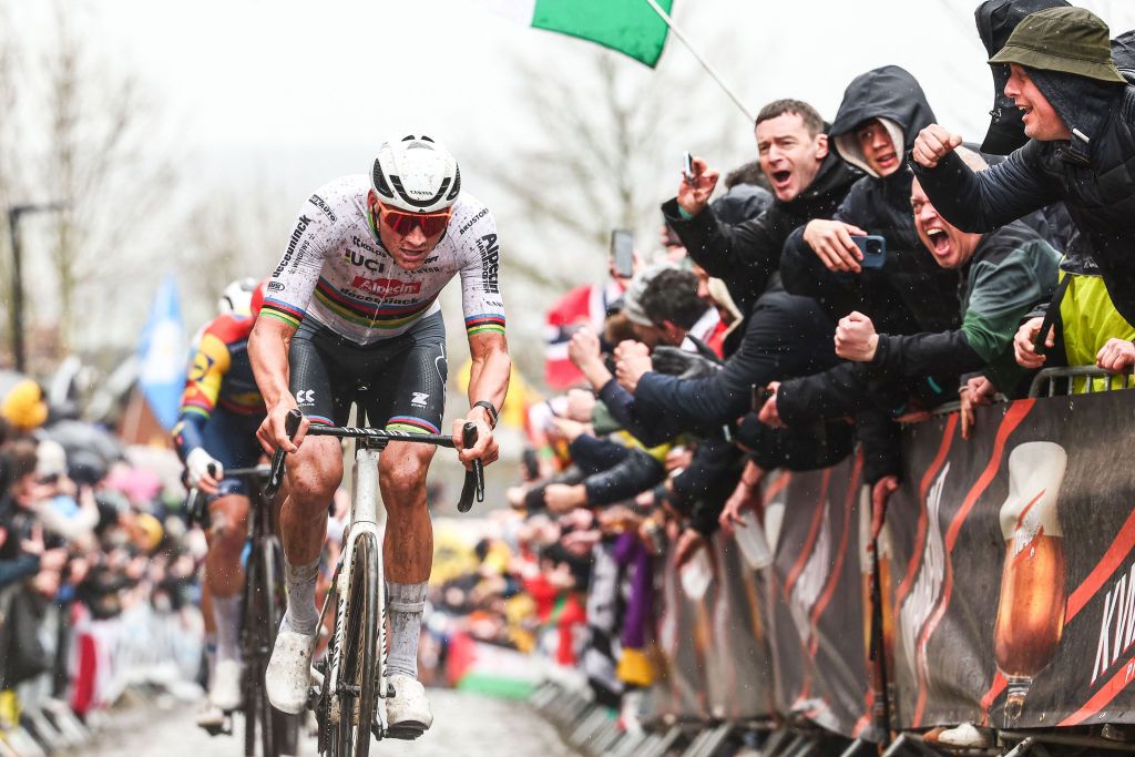 Dutch Mathieu van der Poel of Alpecin-Deceuninck competes in the Oude Kwaremont during the men's race of the 'Ronde van Vlaanderen' (Tour des Flandres) one day cycling race, 270,8 km from Antwerp to Oudenaarde, on March 31, 2024. (Photo by DAVID PINTENS / Belga / AFP) / Belgium OUT