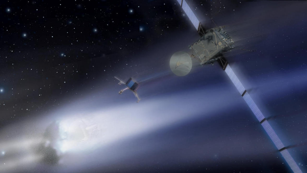 An artist rendering of the Rosetta space craft rendezvousing with a comet. A lander shoots out from the probe as it flies through the haze of the comet's tail.