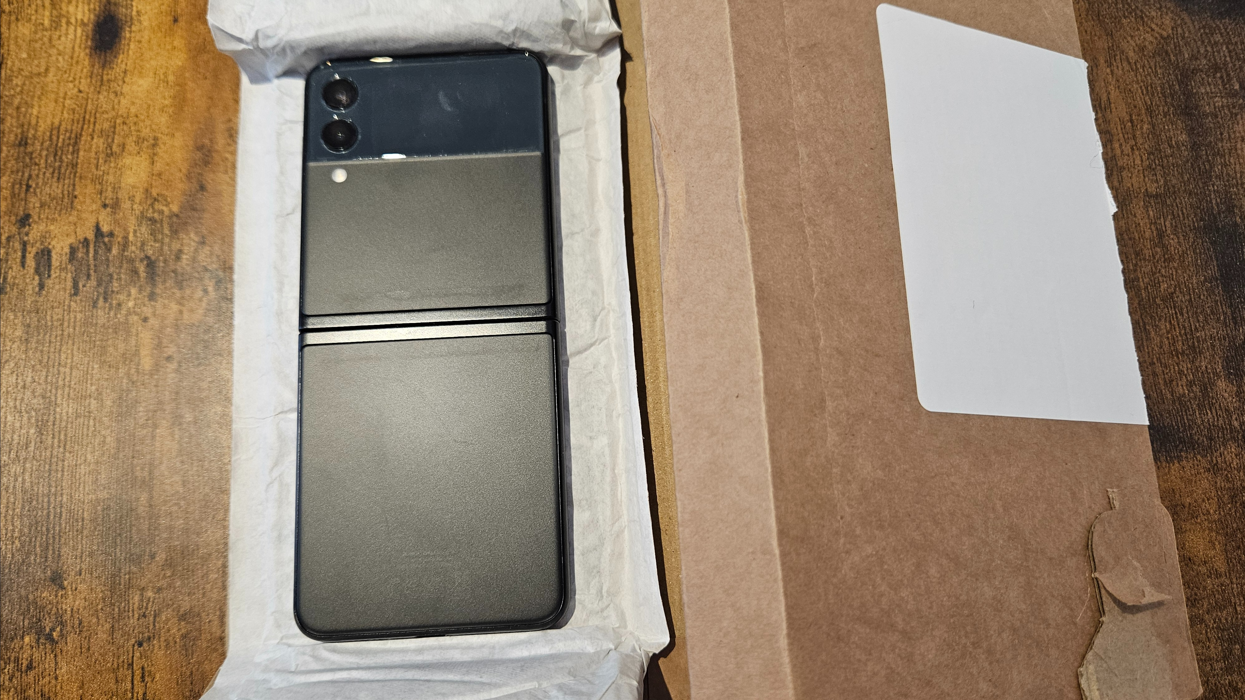 Samsung Galaxy Z Flip 3 in plain cardboard packaging