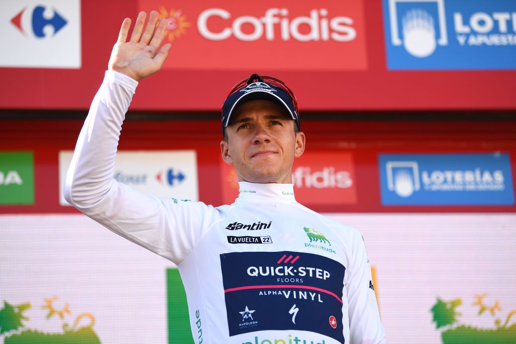MONTILLA SPAIN SEPTEMBER 02 Remco Evenepoel of Belgium and Team QuickStep Alpha Vinyl celebrates at podium as White Best Young Rider Jersey winner during the 77th Tour of Spain 2022 Stage 13 a 1684km stage from Ronda to Montilla 315m LaVuelta22 WorldTour on September 02 2022 in Montilla Spain Photo by Tim de WaeleGetty Images