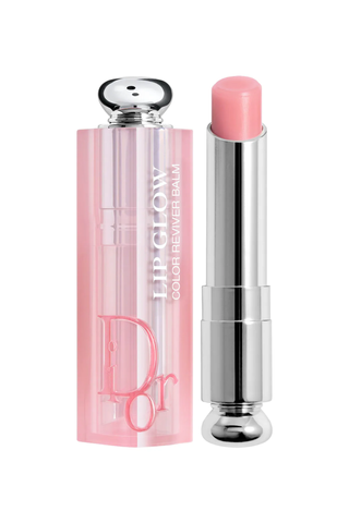 A pink Dior Lip Glow Balm tube and its cap set against a white background.
