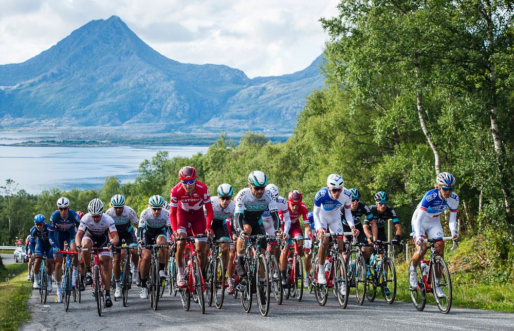 Cyclists ride during the 198,5 km second stage of the Arctic Race of Norway between Mo i Rana and Sandnessjoen