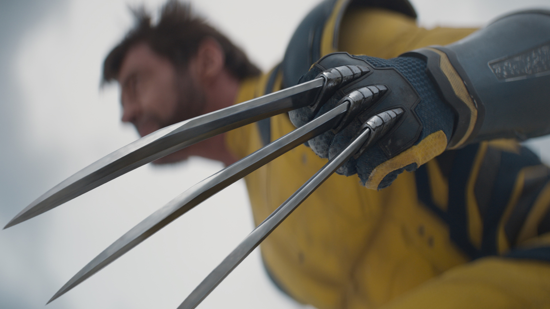 A close up shot of Wolverine bearing his adamantium claws in Marvel's Deadpool and Wolverine film