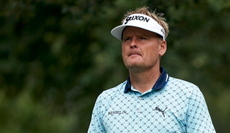 Soren Kjeldsen stares into the distance as he walks off the green