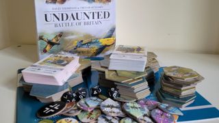 Undaunted: Battle of Britain box, board, and token pieces on a white table