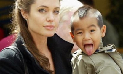 Angelina Jolie with her adopted son, Maddox.