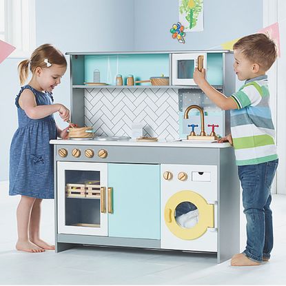 blue wooden kitchen worktop toy