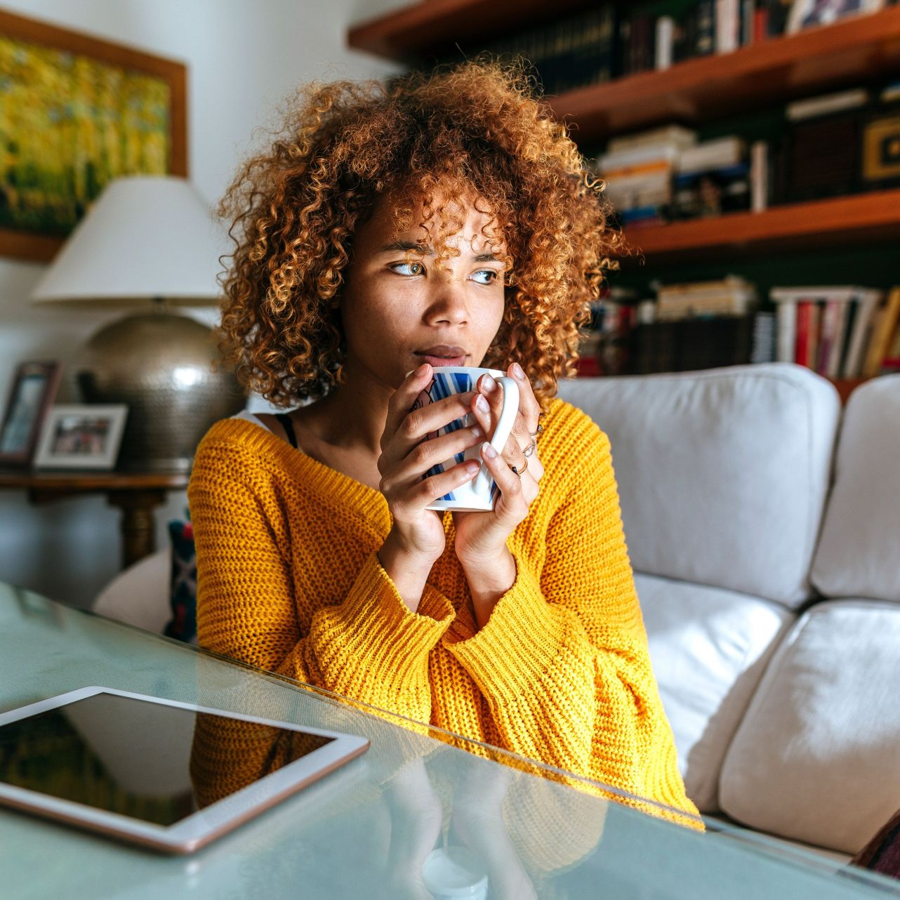 woman in yellow sweater