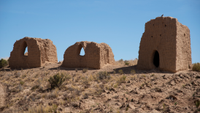 three brick tombs in the Bolivian desert