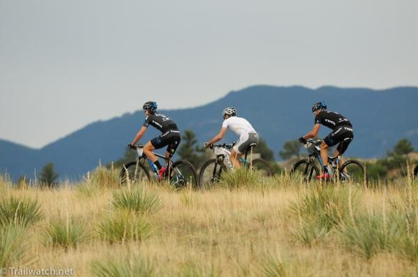 Sid Taberlay is sandwiched between the two Trek riders on the first climb