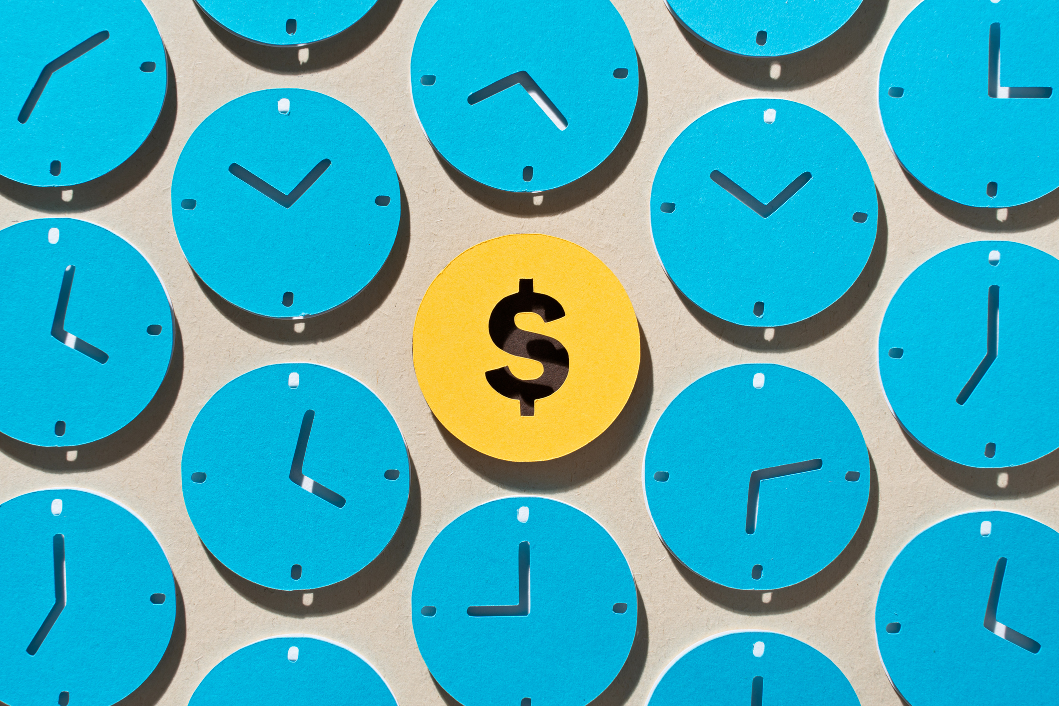 yellow circle with dollar sign in the middle of a group of blue circles that resemble analog clocks