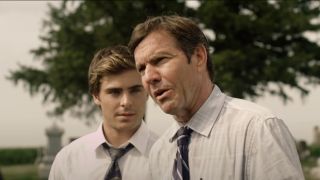 Zac Efron and Dennis Quaid stand together at a funeral in At Any Price.