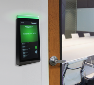 Th Uniguest Black Box Reserva Edge control panel for room scheduling.