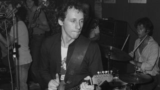 Guitarist Mark Knopfler and drummer Pick Withers, both later of Dire Straits, perform on stage with their eralier band Cafe Racers in a pub in Camden, London, United Kingdom, 1977.