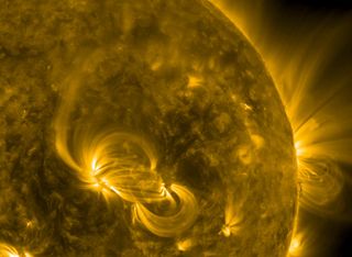 sun spews plasma