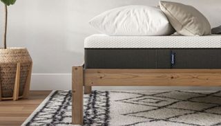 Close up image of Emma Comfort mattress on bed frame
