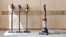 Three Dyson cordless vacuums and one upright Dyson vacuum