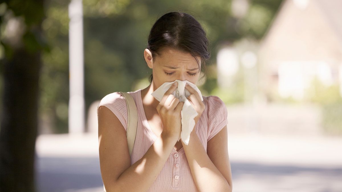 woman suffering with hay fever