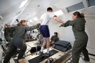 Volunteers walking and running during parabolic flights that induce gravity levels similar to those experienced on the moon.