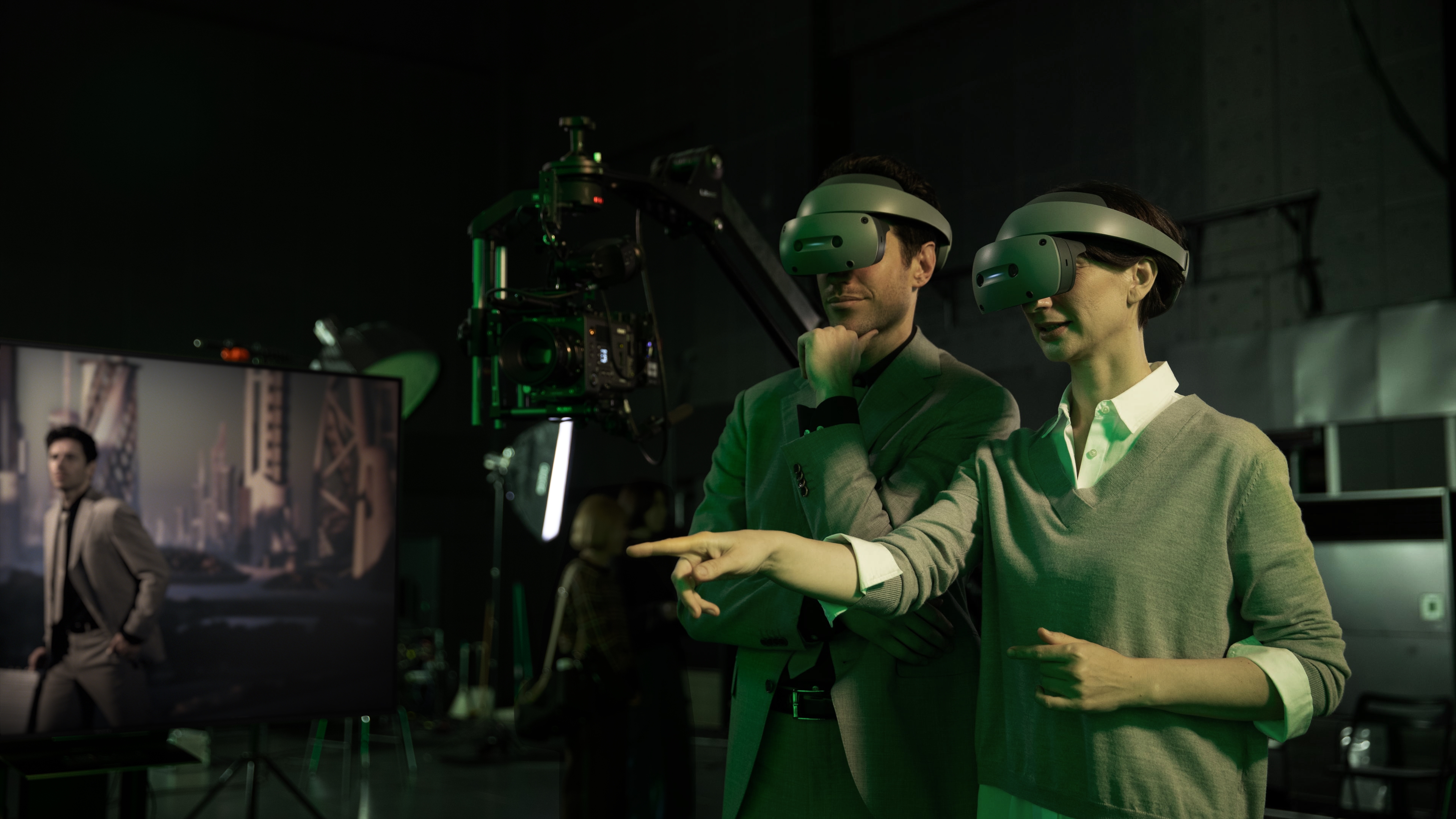 Two people wearing the unnamed Sony XR headset and collaborating on a 3D project