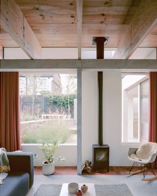 Six Columns House by 31/44 Architects, living space with wood ceiling