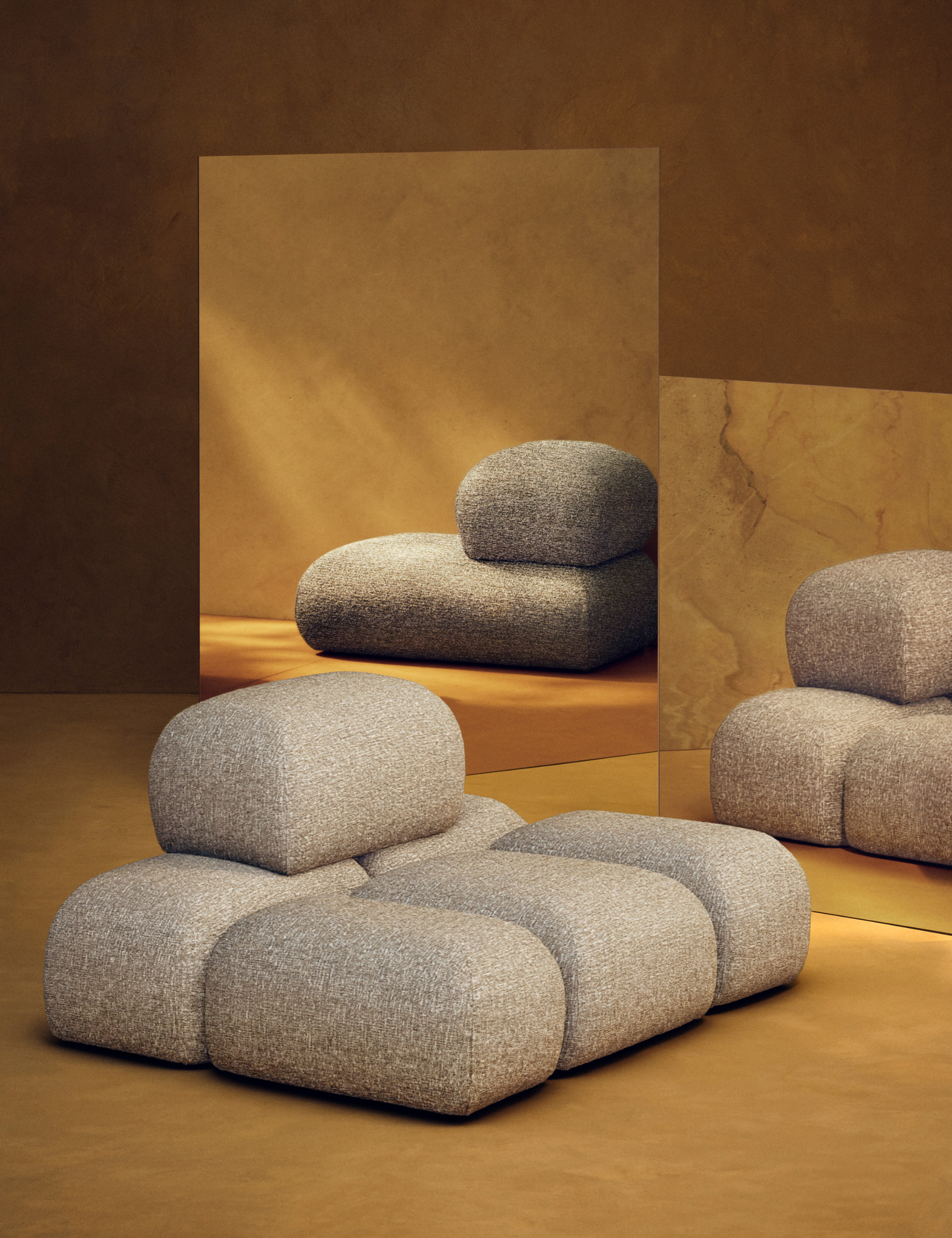 Kelly Wearstler x H&amp;amp;M Home SOLUNA lounge chair pictured in front of gold metallic mirrors