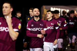 Conor Hourihane of Derby County walks out the tunnel during the Sky Bet League One between Port Vale and Derby County at Vale Park on January 24, 2023 in Burslem, England.