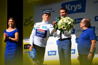 VILLENEUVESURLOT FRANCE JULY 11 Remco Evenepoel of Belgium and Team Soudal QuickStep White Best Young Rider Jersey celebrates at podium during the 111th Tour de France 2024 Stage 12 a 2036km stage from Aurillac to VilleneuvesurLot UCIWT on July 11 2024 in VilleneuvesurLot France Photo by Dario BelingheriGetty Images