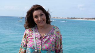 Jane McDonald poses on the beach for Cape Verde with Jane McDonald